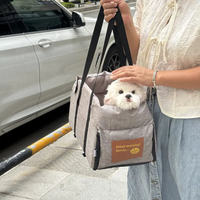 "Portable dog car seat bed with safety harness, designed for small dogs and cats"