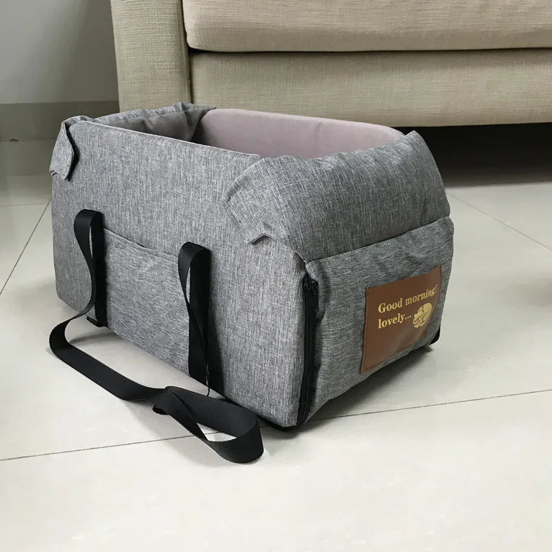 "Portable dog car seat bed with safety harness, designed for small dogs and cats"