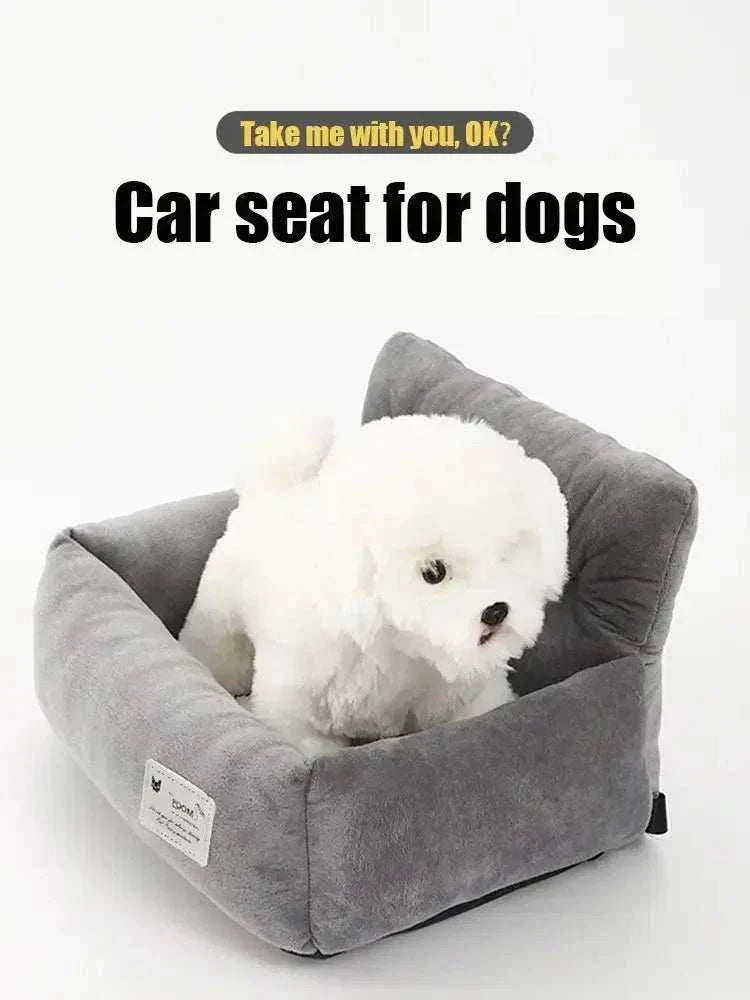 "Small dog car safety seat with secure straps and cozy interior for pets"Safety booster seat for dogs